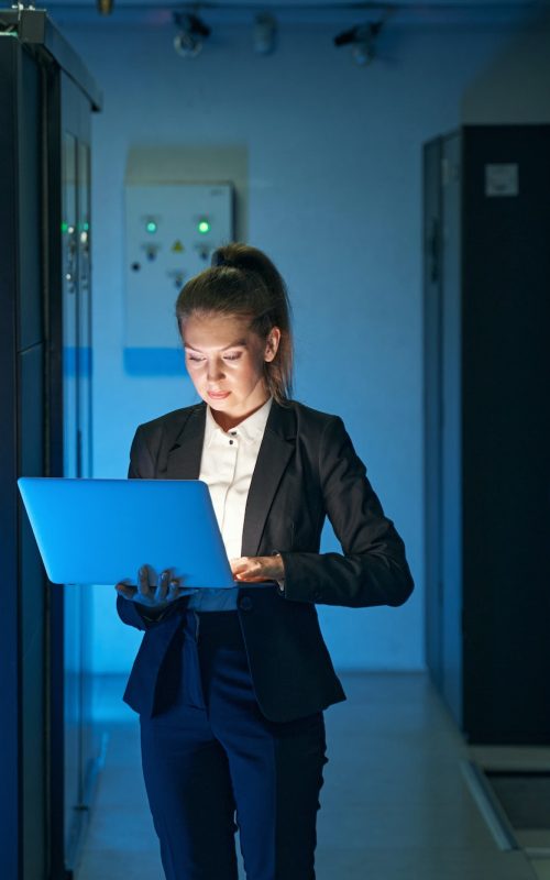 IT engineer specialist working in network server room